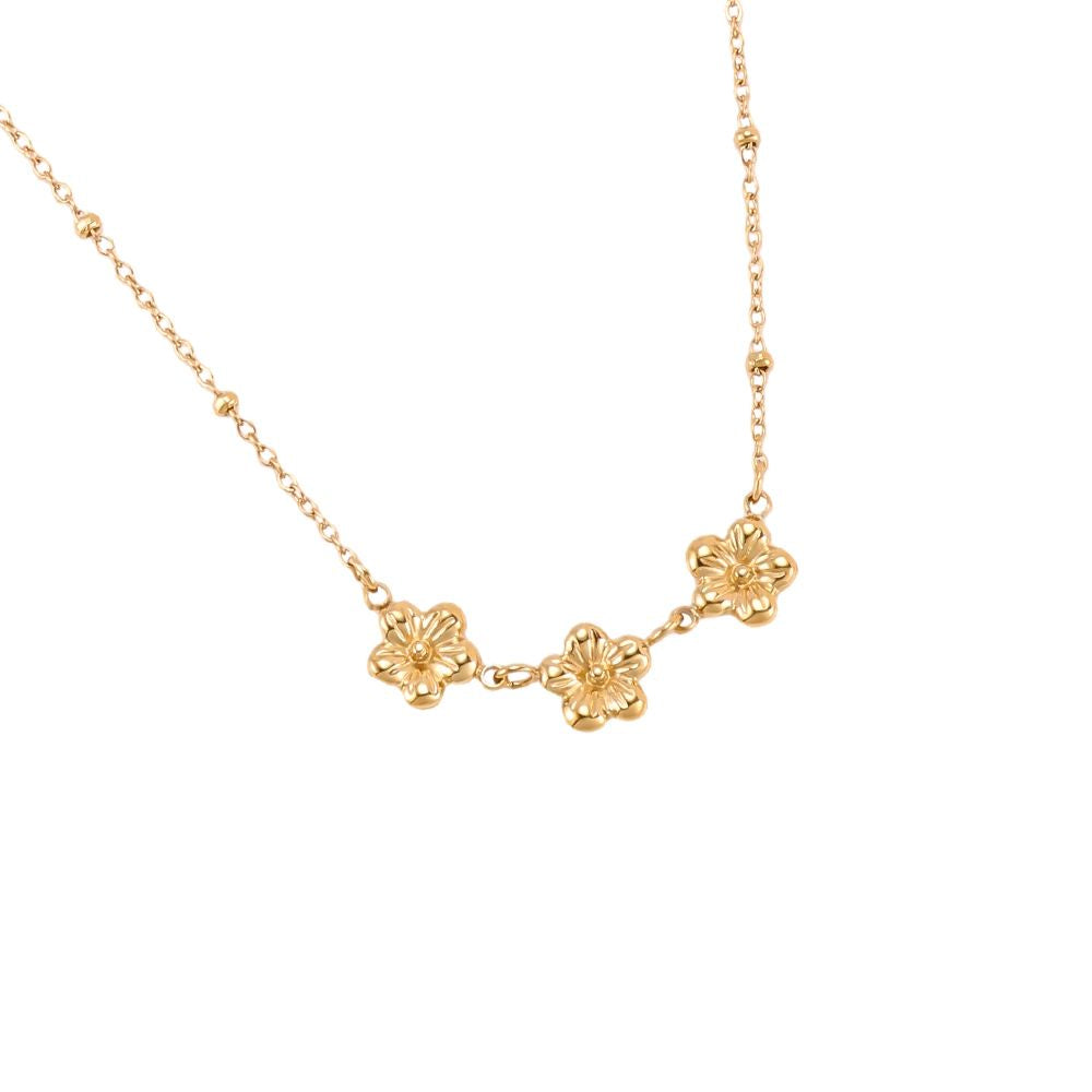 Prato Halskette Detail – feine Blütenmotive in Gelbgold